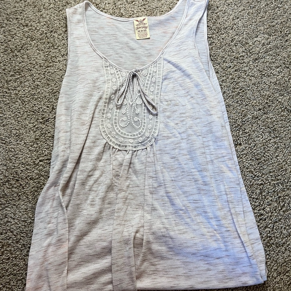 Off white color tank top with tie front worn once